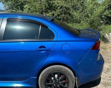 Синій Міцубісі Lancer, об'ємом двигуна 2 л та пробігом 199 тис. км за 6500 $, фото 15 на Automoto.ua