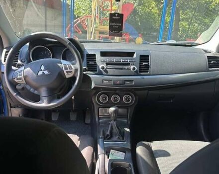 Синій Міцубісі Lancer, об'ємом двигуна 2 л та пробігом 199 тис. км за 6500 $, фото 11 на Automoto.ua