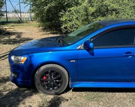 Синій Міцубісі Lancer, об'ємом двигуна 2 л та пробігом 199 тис. км за 6500 $, фото 13 на Automoto.ua