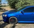 Синій Міцубісі Lancer, об'ємом двигуна 2 л та пробігом 199 тис. км за 6500 $, фото 13 на Automoto.ua