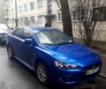 Синий Мицубиси Лансер, объемом двигателя 1.5 л и пробегом 315 тыс. км за 6000 $, фото 1 на Automoto.ua