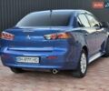 Синий Мицубиси Лансер, объемом двигателя 2 л и пробегом 250 тыс. км за 7699 $, фото 4 на Automoto.ua