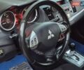 Синий Мицубиси Лансер, объемом двигателя 2 л и пробегом 250 тыс. км за 7699 $, фото 28 на Automoto.ua