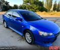 Синій Міцубісі Lancer, об'ємом двигуна 2 л та пробігом 261 тис. км за 7300 $, фото 1 на Automoto.ua