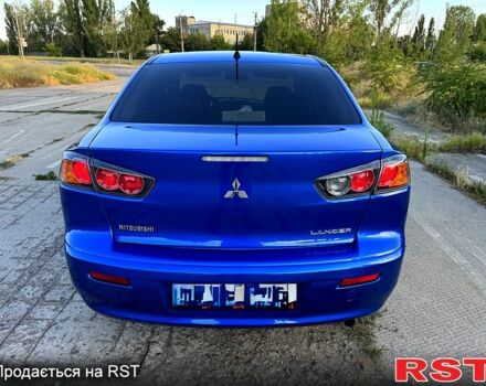 Синий Мицубиси Лансер, объемом двигателя 2 л и пробегом 261 тыс. км за 7300 $, фото 3 на Automoto.ua