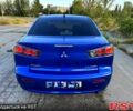 Синий Мицубиси Лансер, объемом двигателя 2 л и пробегом 261 тыс. км за 7300 $, фото 3 на Automoto.ua