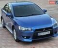 Синий Мицубиси Лансер, объемом двигателя 2 л и пробегом 250 тыс. км за 7699 $, фото 9 на Automoto.ua