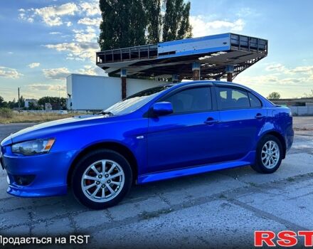 Синий Мицубиси Лансер, объемом двигателя 2 л и пробегом 261 тыс. км за 7300 $, фото 2 на Automoto.ua
