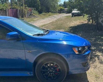 Синій Міцубісі Lancer, об'ємом двигуна 2 л та пробігом 199 тис. км за 6500 $, фото 7 на Automoto.ua