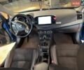 Синій Міцубісі Lancer, об'ємом двигуна 2 л та пробігом 151 тис. км за 7800 $, фото 36 на Automoto.ua