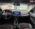Синій Міцубісі Lancer, об'ємом двигуна 2 л та пробігом 151 тис. км за 7800 $, фото 43 на Automoto.ua