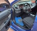 Синий Мицубиси Лансер, объемом двигателя 2 л и пробегом 250 тыс. км за 7699 $, фото 22 на Automoto.ua