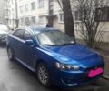 Синий Мицубиси Лансер, объемом двигателя 1.5 л и пробегом 315 тыс. км за 6000 $, фото 1 на Automoto.ua