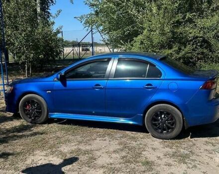 Синій Міцубісі Lancer, об'ємом двигуна 2 л та пробігом 199 тис. км за 6500 $, фото 6 на Automoto.ua