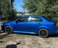 Синій Міцубісі Lancer, об'ємом двигуна 2 л та пробігом 199 тис. км за 6500 $, фото 6 на Automoto.ua