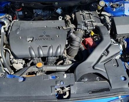 Синий Мицубиси Лансер, объемом двигателя 2 л и пробегом 171 тыс. км за 8750 $, фото 13 на Automoto.ua