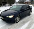 Синий Мицубиси Лансер, объемом двигателя 2 л и пробегом 205 тыс. км за 6800 $, фото 1 на Automoto.ua