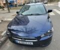 Синий Мицубиси Лансер, объемом двигателя 2 л и пробегом 150 тыс. км за 8500 $, фото 1 на Automoto.ua