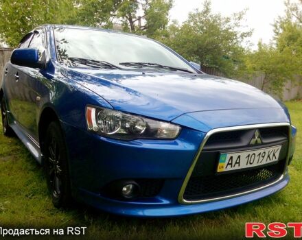 Синій Міцубісі Lancer, об'ємом двигуна 1.6 л та пробігом 268 тис. км за 6999 $, фото 3 на Automoto.ua