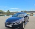 Синій Міцубісі Lancer, об'ємом двигуна 2 л та пробігом 243 тис. км за 6000 $, фото 1 на Automoto.ua