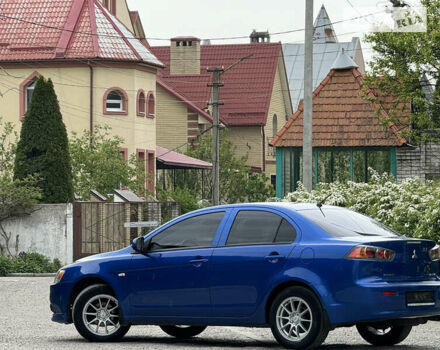 Синій Міцубісі Lancer, об'ємом двигуна 1.59 л та пробігом 150 тис. км за 7850 $, фото 13 на Automoto.ua