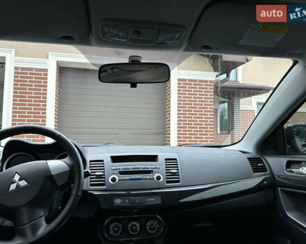 Синий Мицубиси Лансер, объемом двигателя 1.6 л и пробегом 37 тыс. км за 10999 $, фото 15 на Automoto.ua