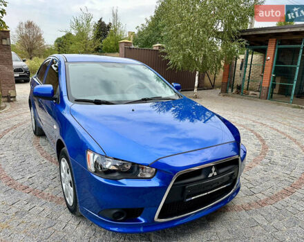 Синий Мицубиси Лансер, объемом двигателя 1.6 л и пробегом 37 тыс. км за 10999 $, фото 1 на Automoto.ua