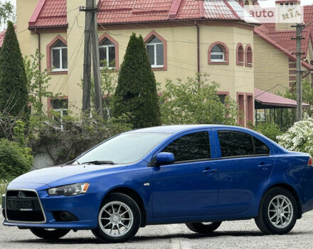 Синій Міцубісі Lancer, об'ємом двигуна 1.59 л та пробігом 150 тис. км за 7850 $, фото 1 на Automoto.ua