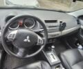 Синій Міцубісі Lancer, об'ємом двигуна 2 л та пробігом 150 тис. км за 8500 $, фото 6 на Automoto.ua
