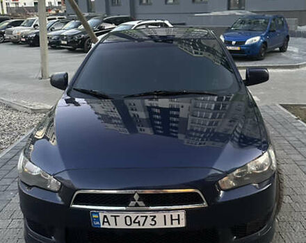Синий Мицубиси Лансер, объемом двигателя 2 л и пробегом 170 тыс. км за 8400 $, фото 11 на Automoto.ua