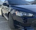 Синій Міцубісі Lancer, об'ємом двигуна 2 л та пробігом 170 тис. км за 7950 $, фото 1 на Automoto.ua