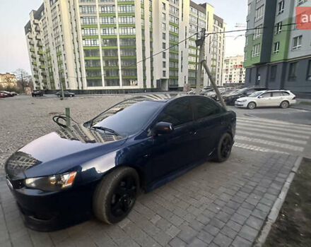 Синий Мицубиси Лансер, объемом двигателя 2 л и пробегом 170 тыс. км за 8400 $, фото 9 на Automoto.ua