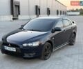 Синий Мицубиси Лансер, объемом двигателя 2 л и пробегом 140 тыс. км за 5750 $, фото 1 на Automoto.ua