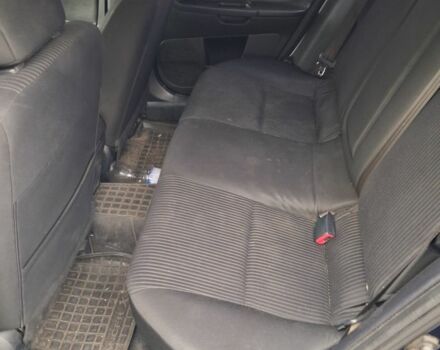 Синий Мицубиси Лансер, объемом двигателя 2 л и пробегом 233 тыс. км за 7000 $, фото 7 на Automoto.ua