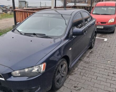 Синий Мицубиси Лансер, объемом двигателя 2 л и пробегом 233 тыс. км за 7000 $, фото 4 на Automoto.ua