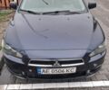 Синий Мицубиси Лансер, объемом двигателя 2 л и пробегом 233 тыс. км за 7000 $, фото 1 на Automoto.ua