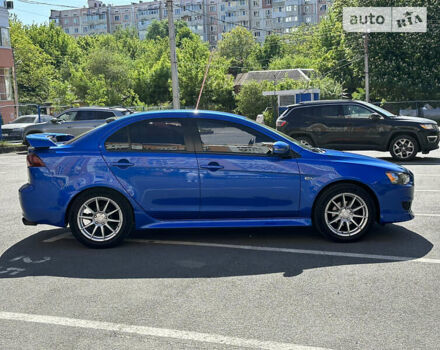 Синій Міцубісі Lancer, об'ємом двигуна 2 л та пробігом 113 тис. км за 10500 $, фото 3 на Automoto.ua