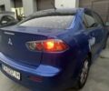 Синий Мицубиси Лансер, объемом двигателя 2 л и пробегом 157 тыс. км за 6670 $, фото 1 на Automoto.ua