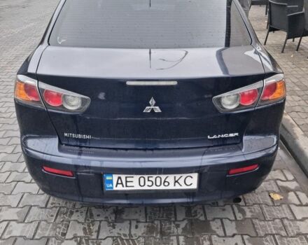 Синий Мицубиси Лансер, объемом двигателя 2 л и пробегом 233 тыс. км за 7000 $, фото 1 на Automoto.ua
