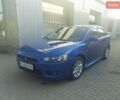 Синій Міцубісі Lancer, об'ємом двигуна 2 л та пробігом 182 тис. км за 9700 $, фото 1 на Automoto.ua