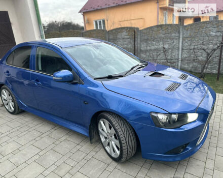 Синій Міцубісі Lancer, об'ємом двигуна 2 л та пробігом 192 тис. км за 15000 $, фото 18 на Automoto.ua