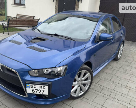 Синій Міцубісі Lancer, об'ємом двигуна 2 л та пробігом 192 тис. км за 15000 $, фото 11 на Automoto.ua