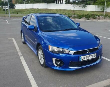 Синий Мицубиси Лансер, объемом двигателя 2 л и пробегом 153 тыс. км за 8500 $, фото 5 на Automoto.ua