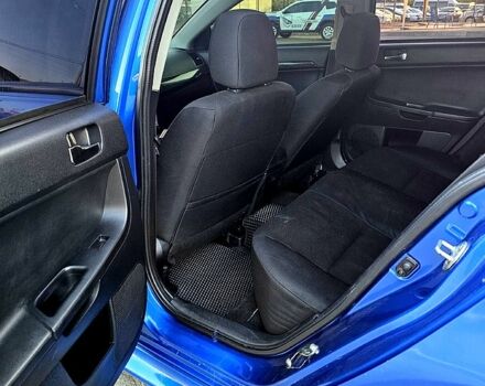 Синий Мицубиси Лансер, объемом двигателя 2 л и пробегом 190 тыс. км за 9999 $, фото 7 на Automoto.ua