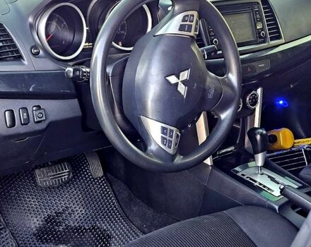 Синий Мицубиси Лансер, объемом двигателя 2 л и пробегом 190 тыс. км за 9999 $, фото 6 на Automoto.ua