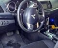 Синий Мицубиси Лансер, объемом двигателя 2 л и пробегом 190 тыс. км за 9999 $, фото 6 на Automoto.ua