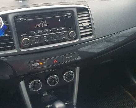 Синий Мицубиси Лансер, объемом двигателя 2 л и пробегом 153 тыс. км за 8500 $, фото 1 на Automoto.ua