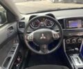 Синій Міцубісі Lancer, об'ємом двигуна 2 л та пробігом 180 тис. км за 9290 $, фото 20 на Automoto.ua