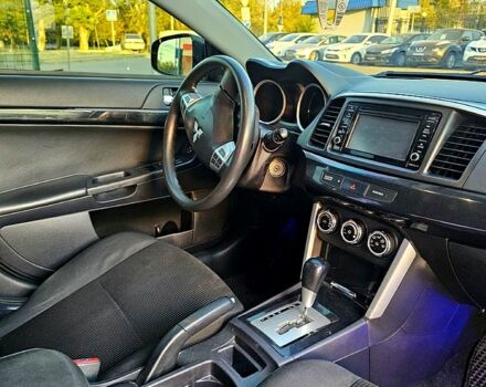 Синий Мицубиси Лансер, объемом двигателя 2 л и пробегом 190 тыс. км за 9999 $, фото 5 на Automoto.ua