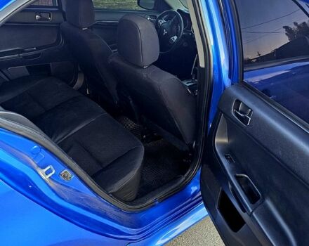 Синий Мицубиси Лансер, объемом двигателя 2 л и пробегом 190 тыс. км за 9999 $, фото 4 на Automoto.ua